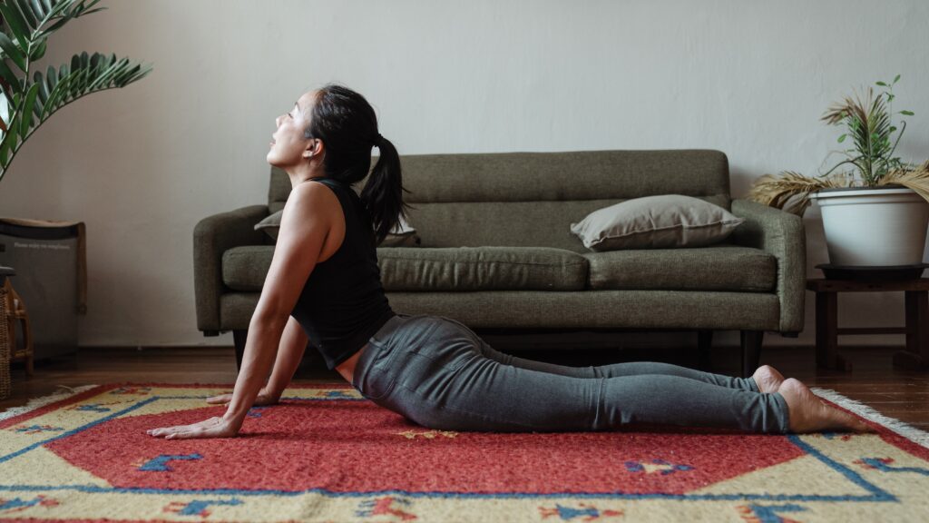 Bhujangasana or "Cobra Pose"- 5 Easy Yoga Poses To Reduce Period Cramps
